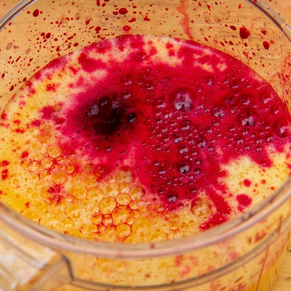 Juicing beets into orange juice