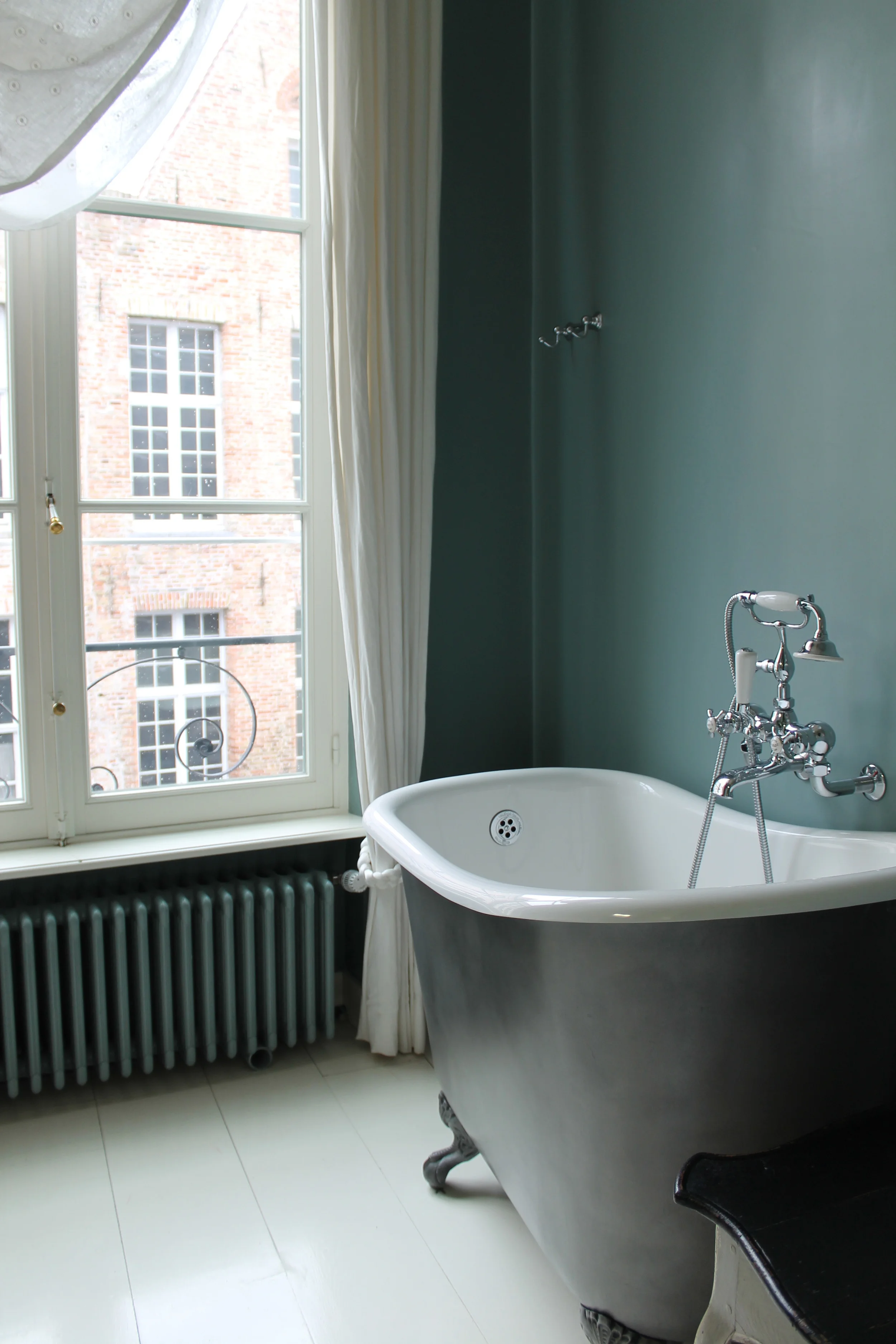 Our gorgeous claw foot tub in Belgium. 