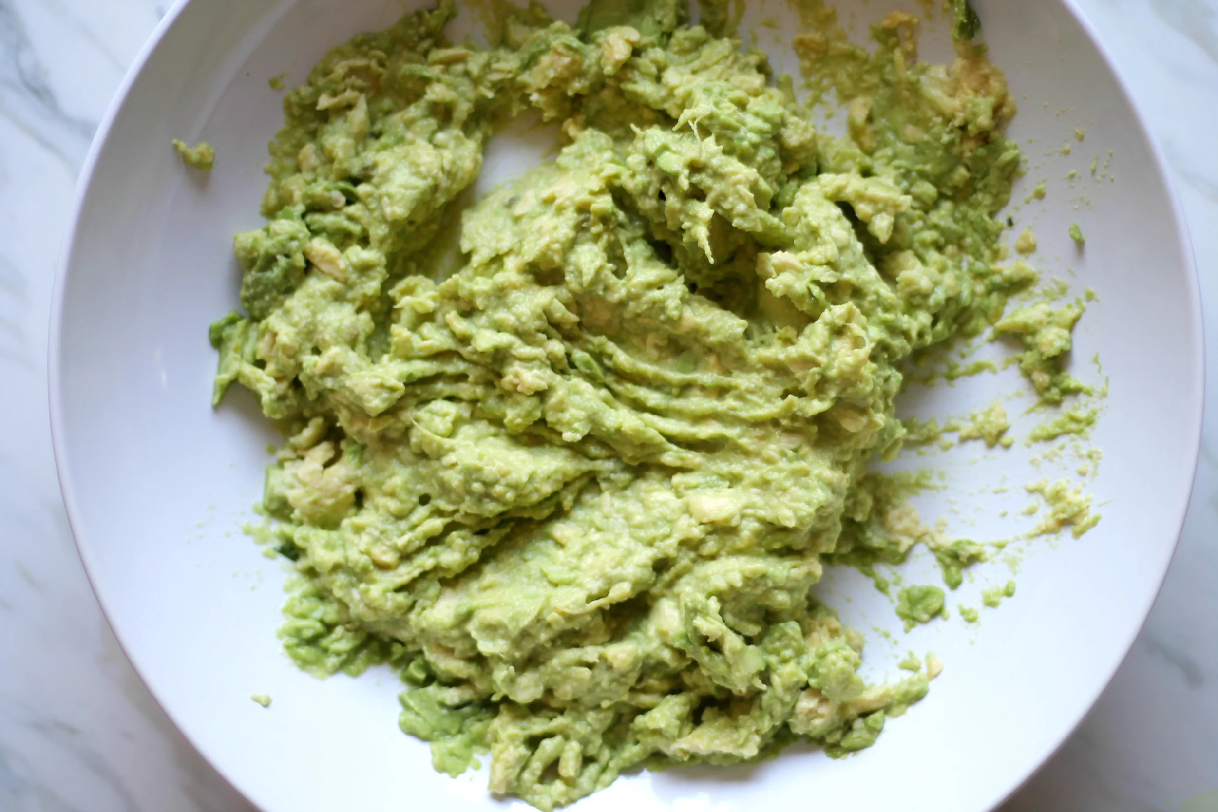 Mash up all your avocado thoroughly.