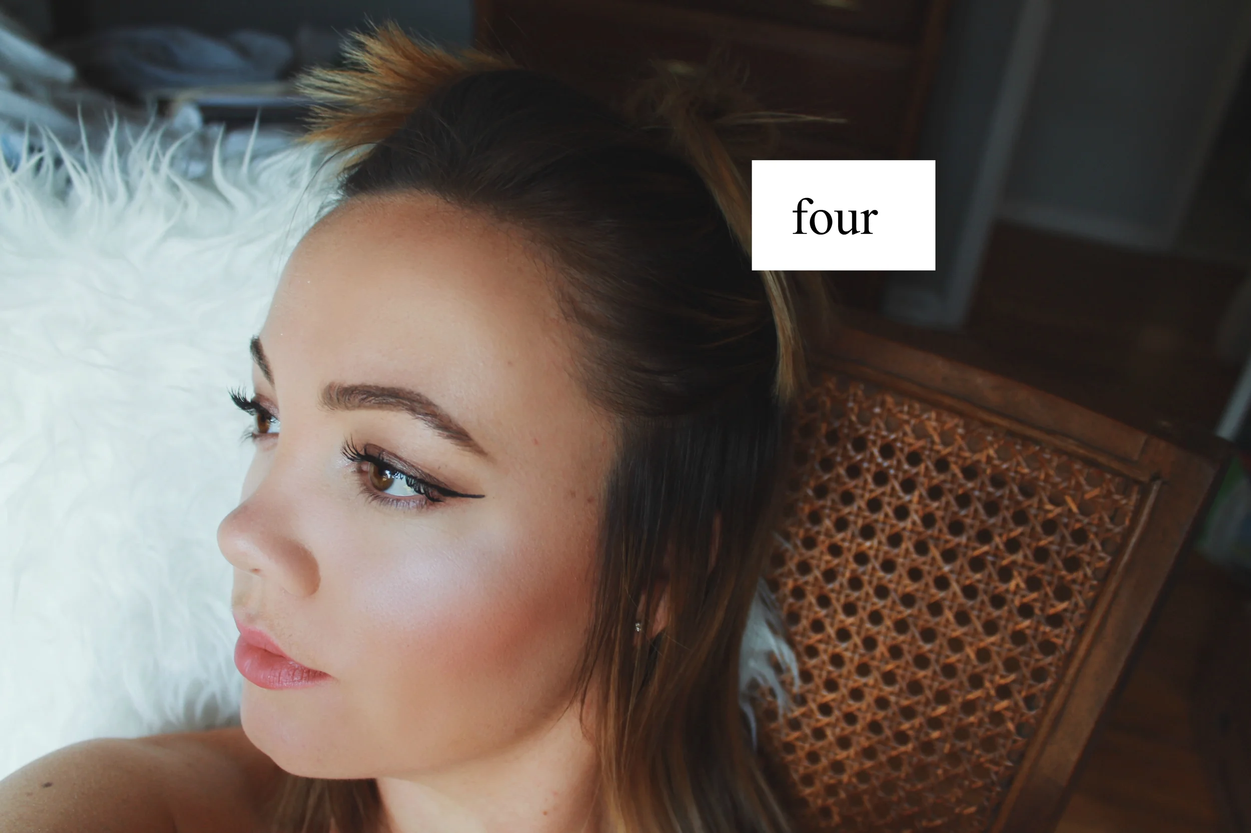 Pin your hair half up so we can curl in sections. 