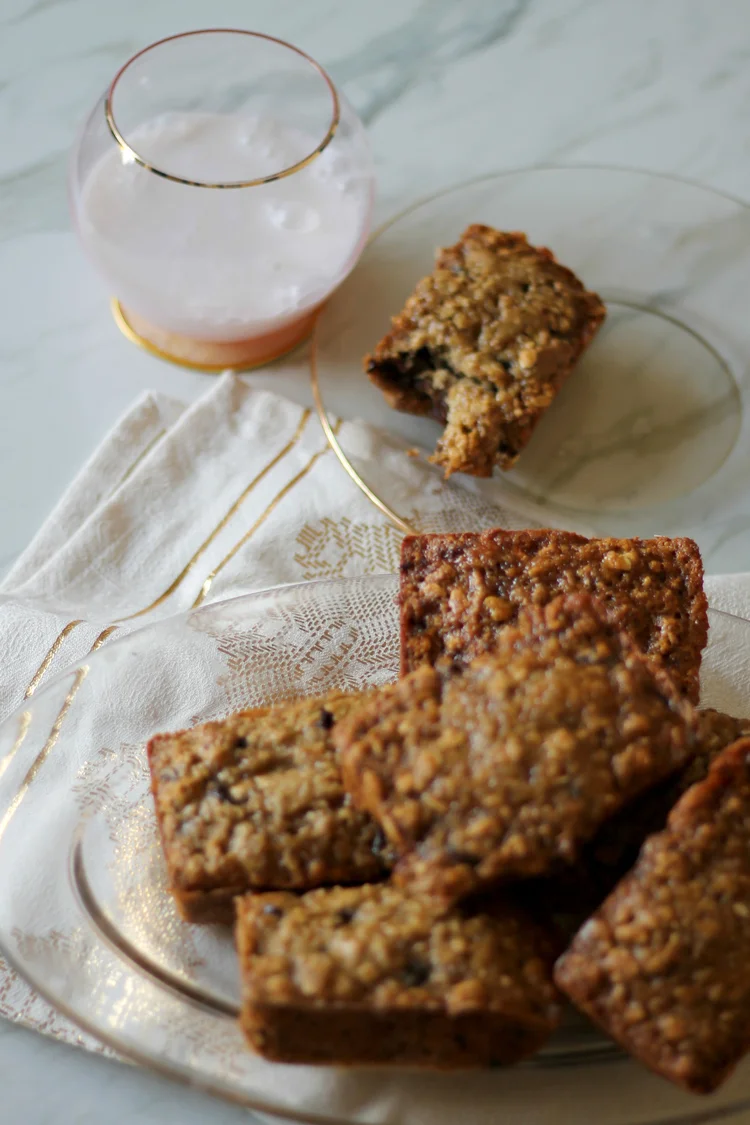 You will need: 3 large ripe organic bananas 1/2 cup organic honey 1 beaten egg 1 teaspoon baking soda 1 1/2 teaspoon baking powder 1/2 teaspoon salt 1 teaspoon cinnamon 1 cup spelt flour (regular unbleached will do but if you are trying to be extra healthy I like spelt) 1/2 cup oatmeal 3/4 cups chocolate chips Preheat the oven to 350˚. Add all ingredients to an electric mixing bowl and beat until combined. Butter and flour mini loaf pan or you can use a muffin tin. If you are dairy free substitute the butter with coconut oil. Using these small pans is better than a large loaf pan because it makes more moist bread. Bake at 350˚ for 20 minutes. 
