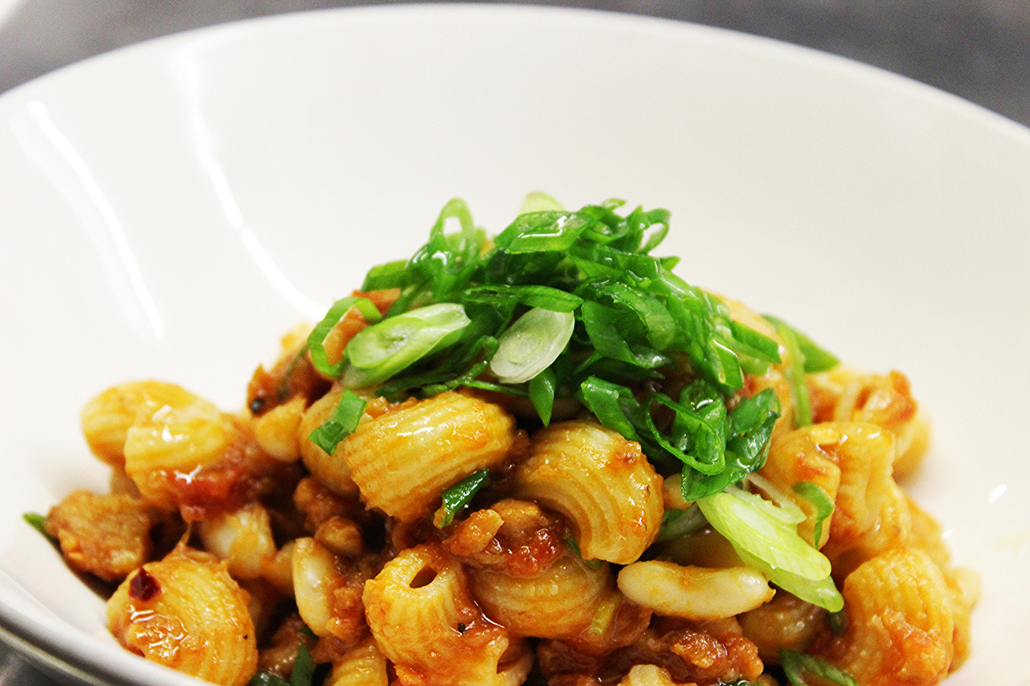 Lumache pasta with monkfish ragu and cannelini beans. Source: Runner & Stone