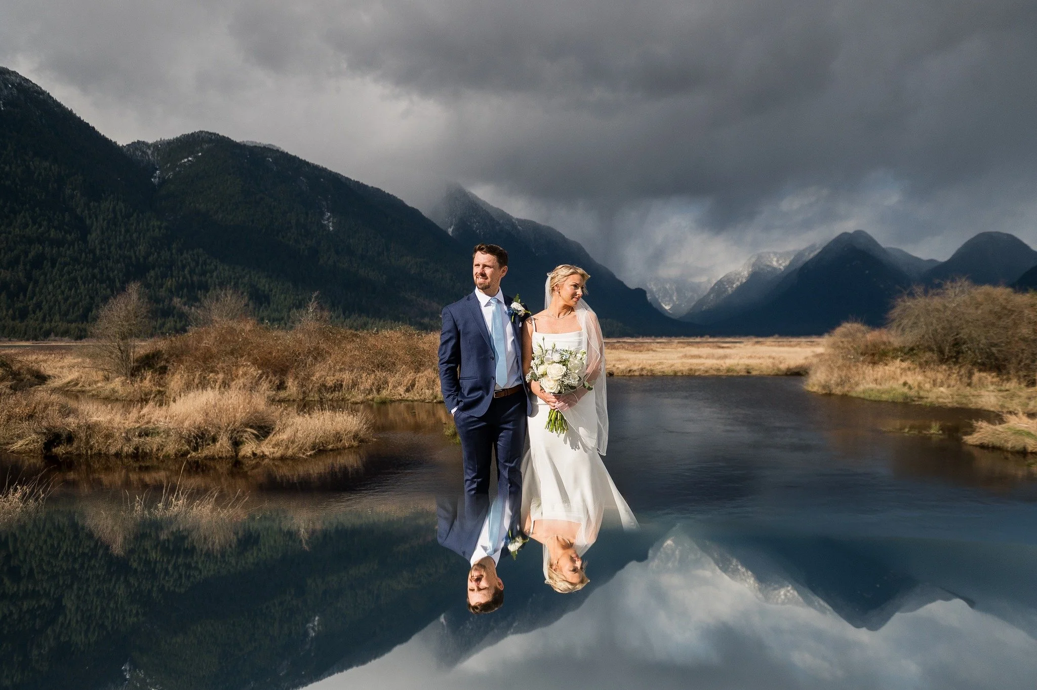 The moody clouds set in, but the sun was shining on this happy couple. 🌤️💍

#pittmeadowswedding #goldeneaglewedding #vancouverweddingphotographer