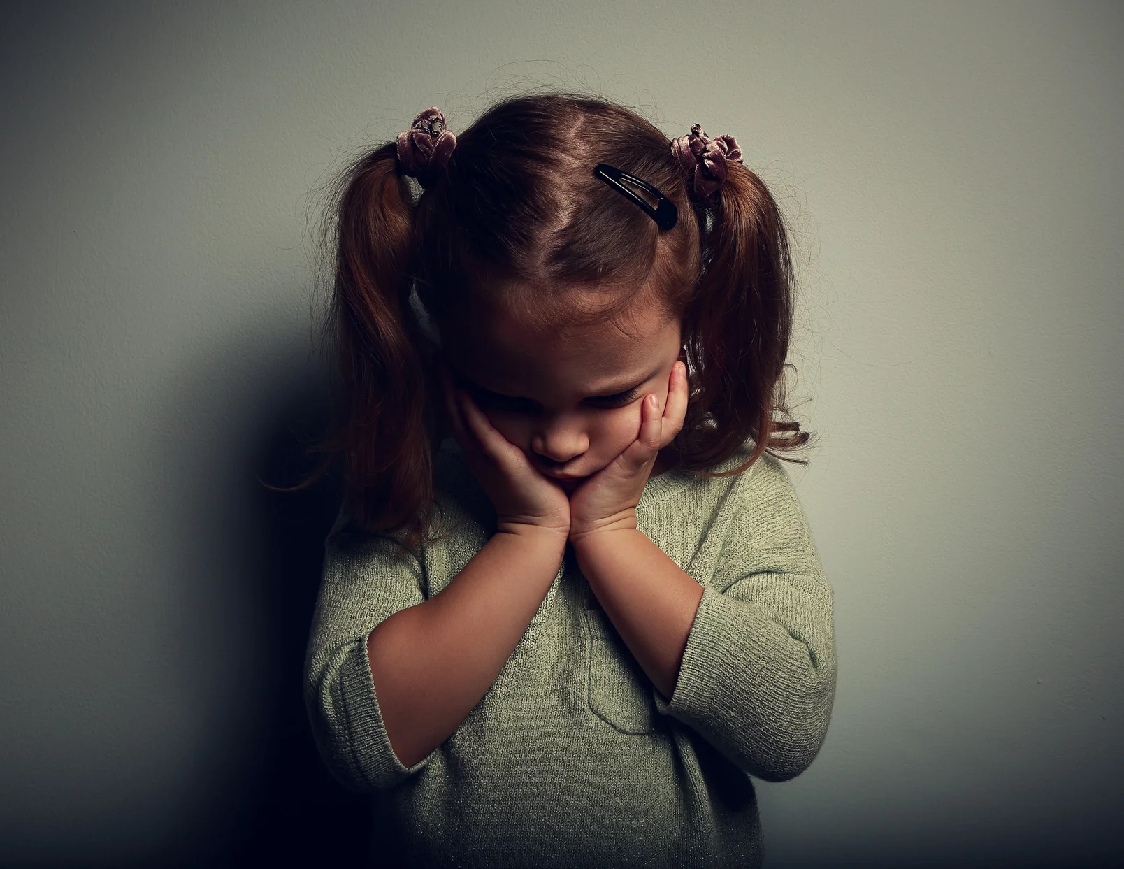 photodune-10722429-sad-crying-alone-kid-girl-on-dark-background-m.jpg