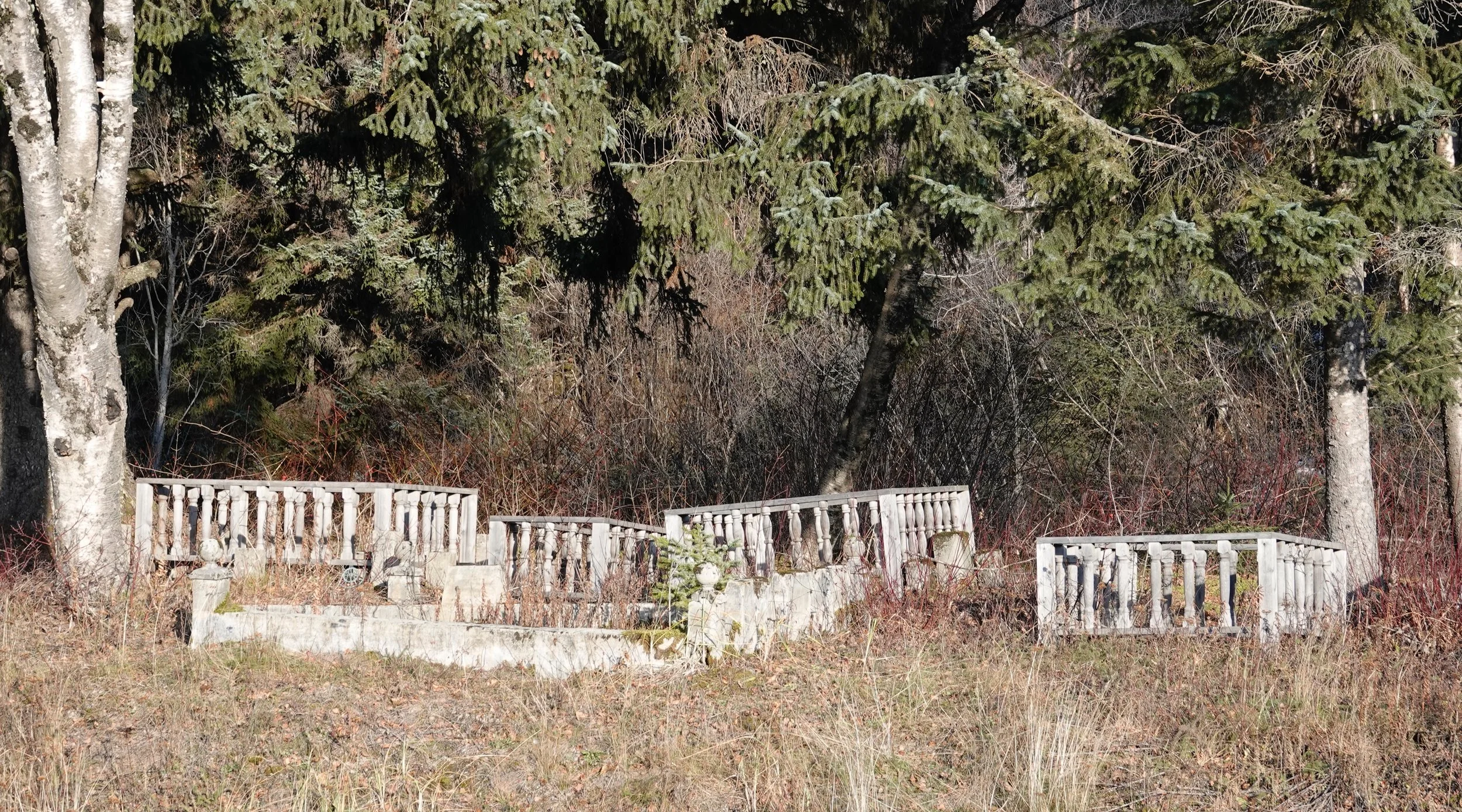 Fenced graves at a cemetery in Haines, Alaska.
