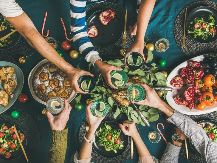 hands-cheersing-at-table-2.jpg