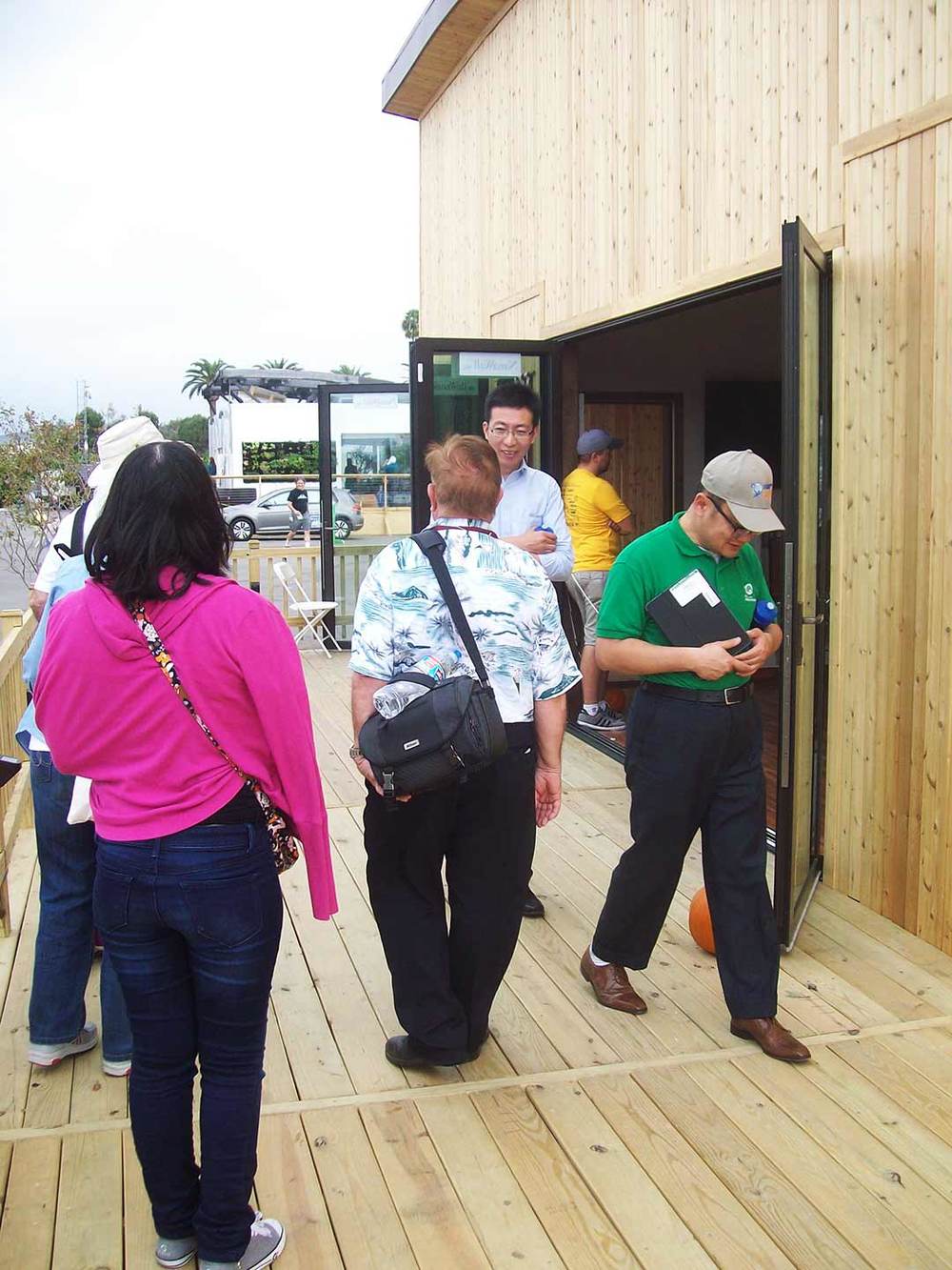  Visitors exchange discussions on our homes systems and exchanging personal stories on our large porch. 