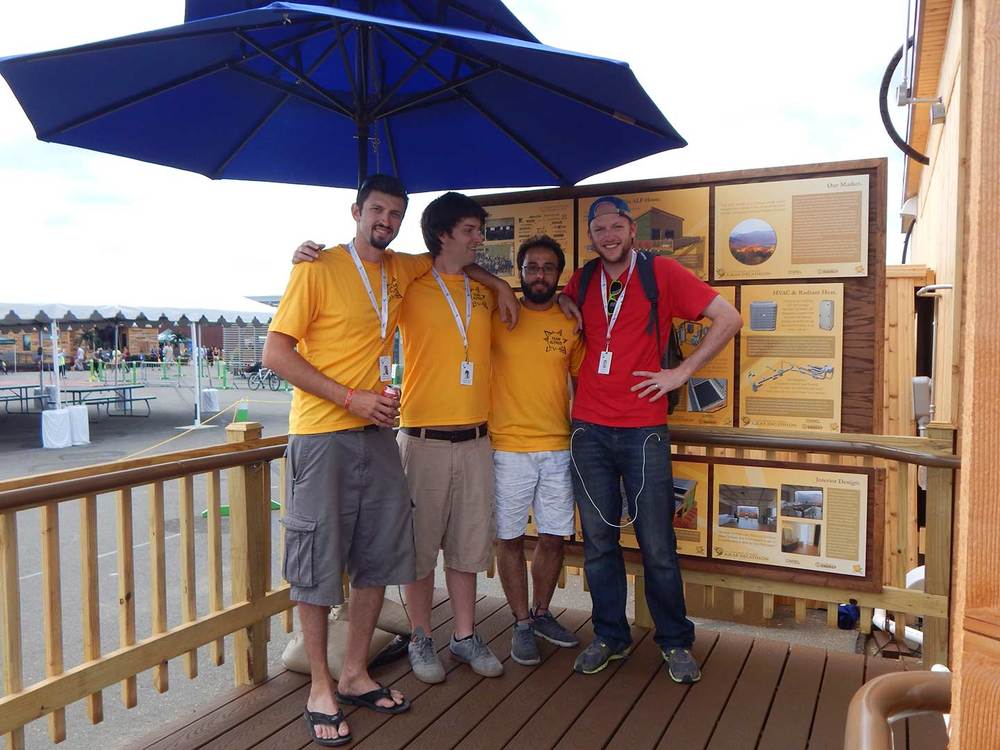 Group Photo in front of Poster Display!