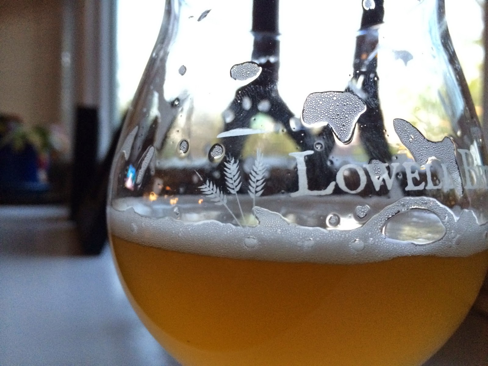 Lowell Brewing's American Saison in the glass.