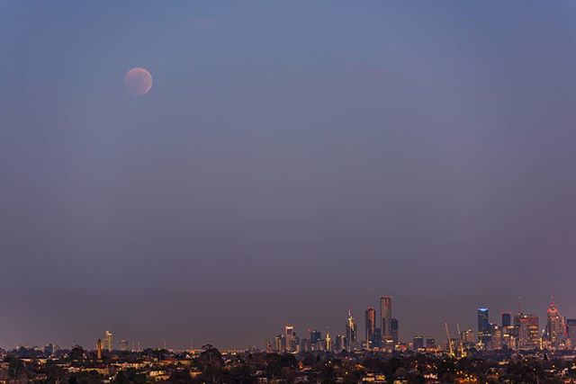 This was one of the last images I captured of the July lunar eclipse. The moon was setting over the city, as the morning sun cast a light magenta hue across the sky. Not a bad way to experience a sunrise on a cold winter's morning.