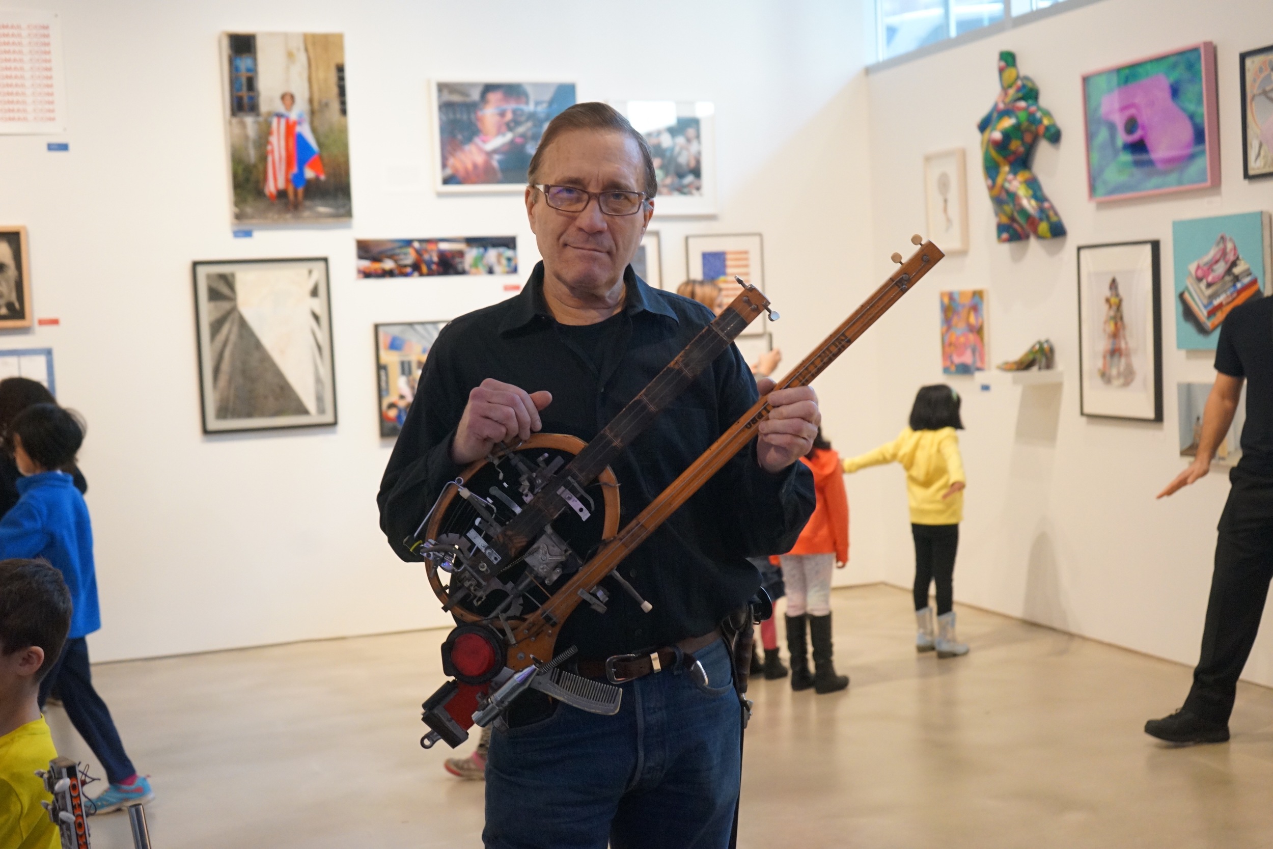 Ken Butler, with some sort of hockey stick violin-guitar-banjo hybrid thing that can only be described as next-level.