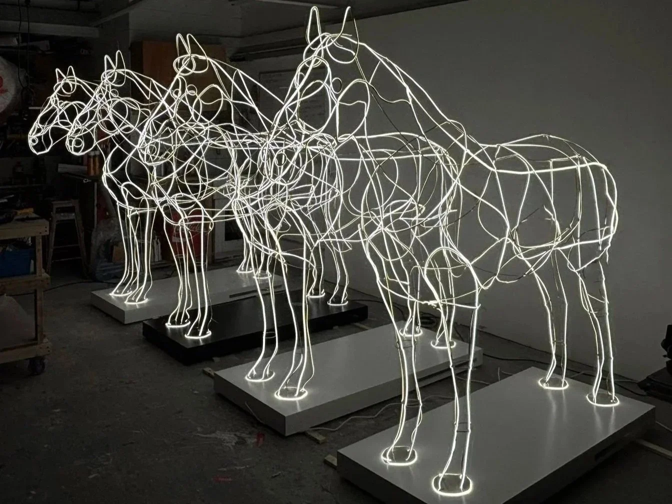 illuminated steel horse sculptures for COS