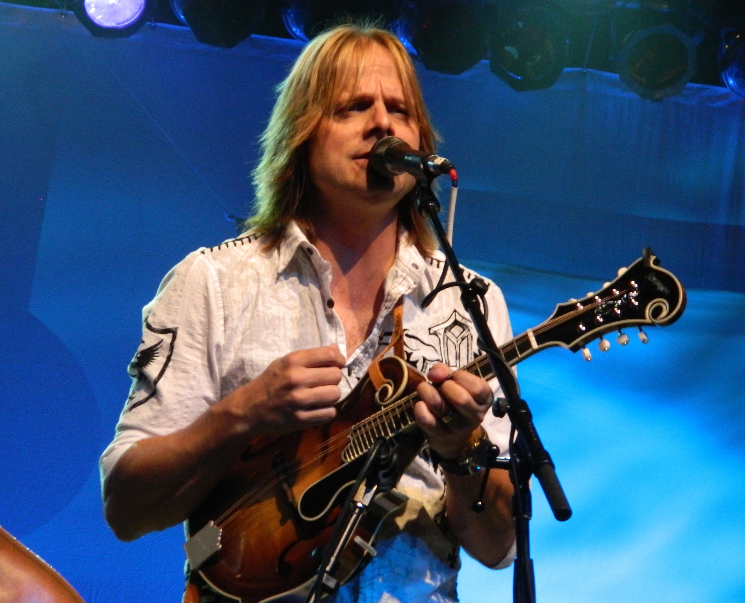 lee roy with his f8 mandolin. photo courtesy of the roys.