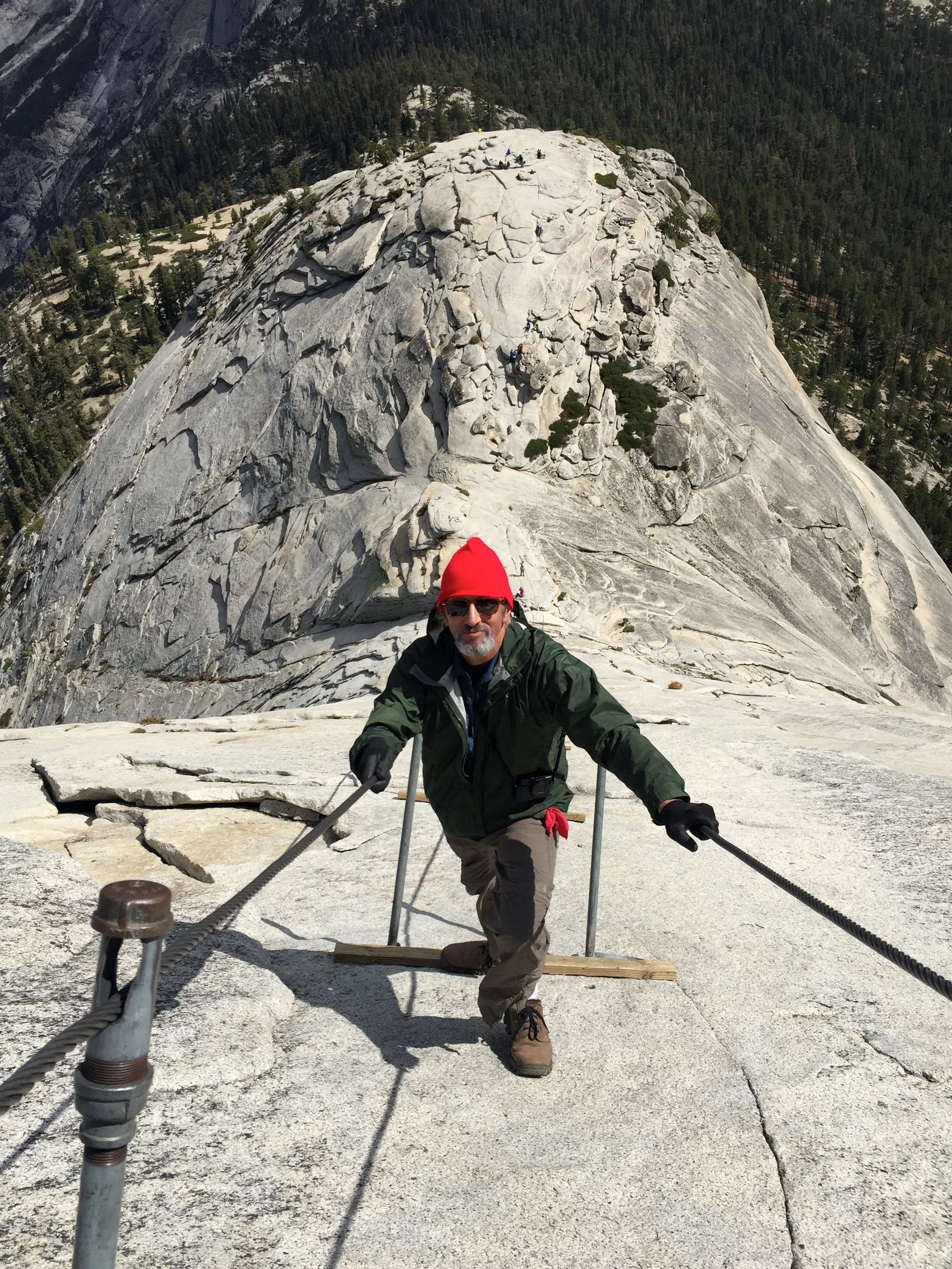 Rama's great photo of Dave on the cables.