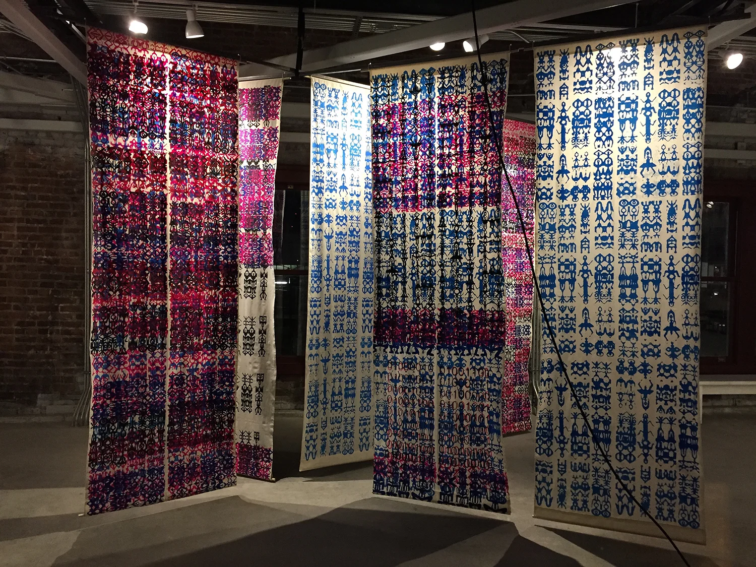 Romson Regarde Bustillo, The Biology of Culture: Cue Signaling, serigraph on muslin. Six 3'2.5" x 10', 2016. Pratt Fine Arts: print studio. Artist Trust: documentation