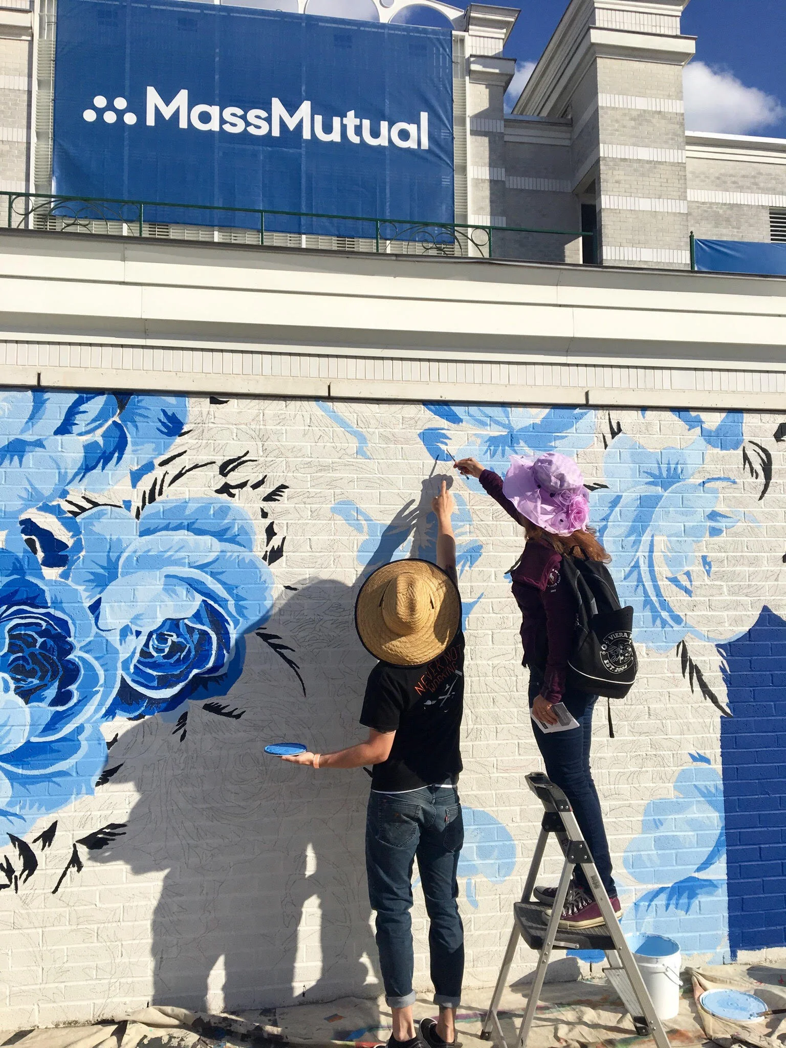 Jeremy Lewis creating mural 2.jpg