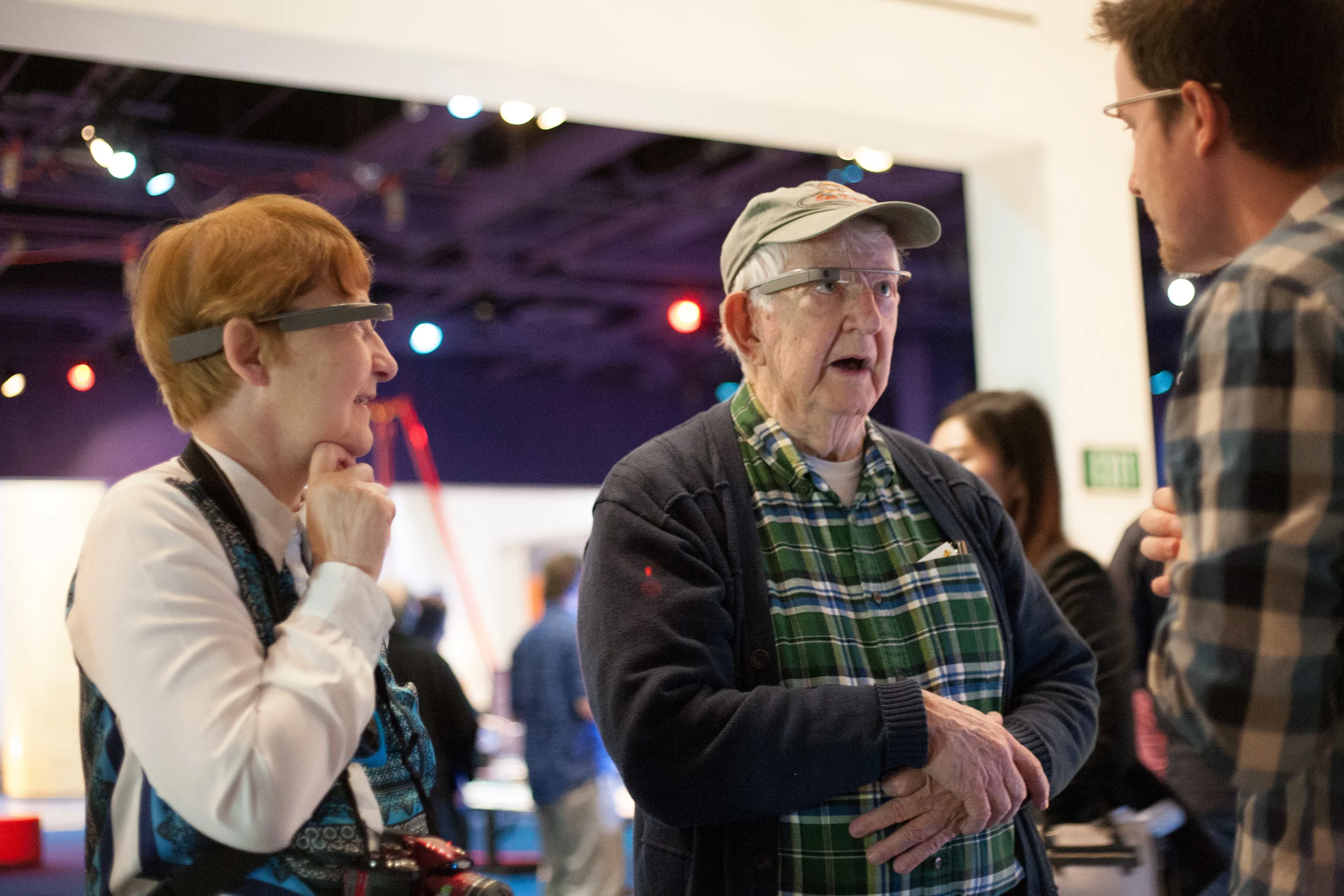Visitors to San Jose's Tech Museum of Innovation try Glass for the very first time.