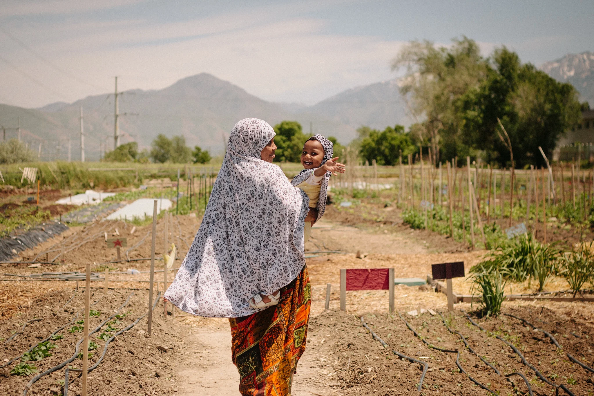 The IRC's New Roots program works with Salt Lake City refugee communities to increase food access and provide technical training. Participants operate a small-scale urban farm, supplying numerous local restaurants and farm stands with produce.