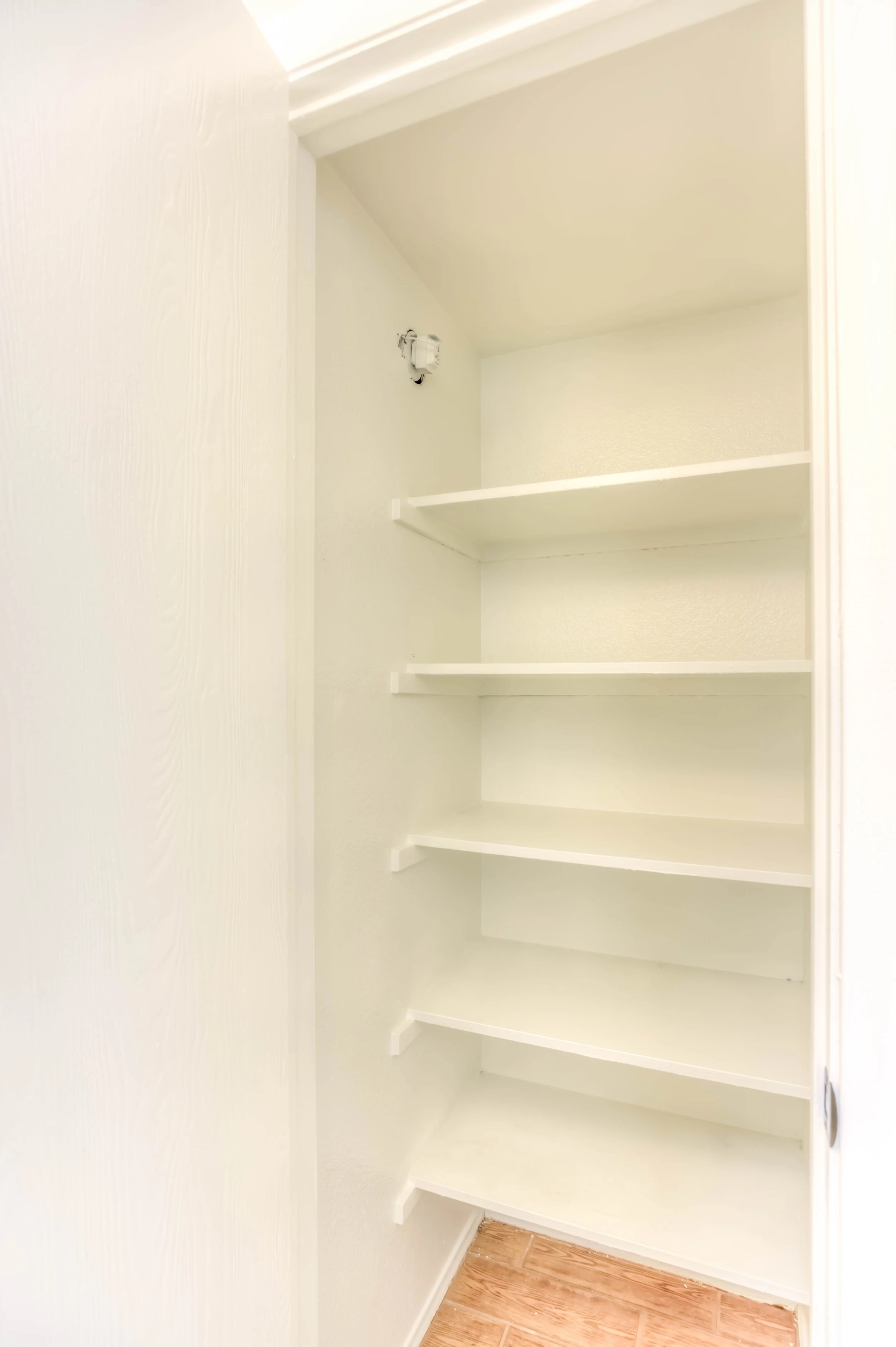24 Hall Linen Closet.jpg