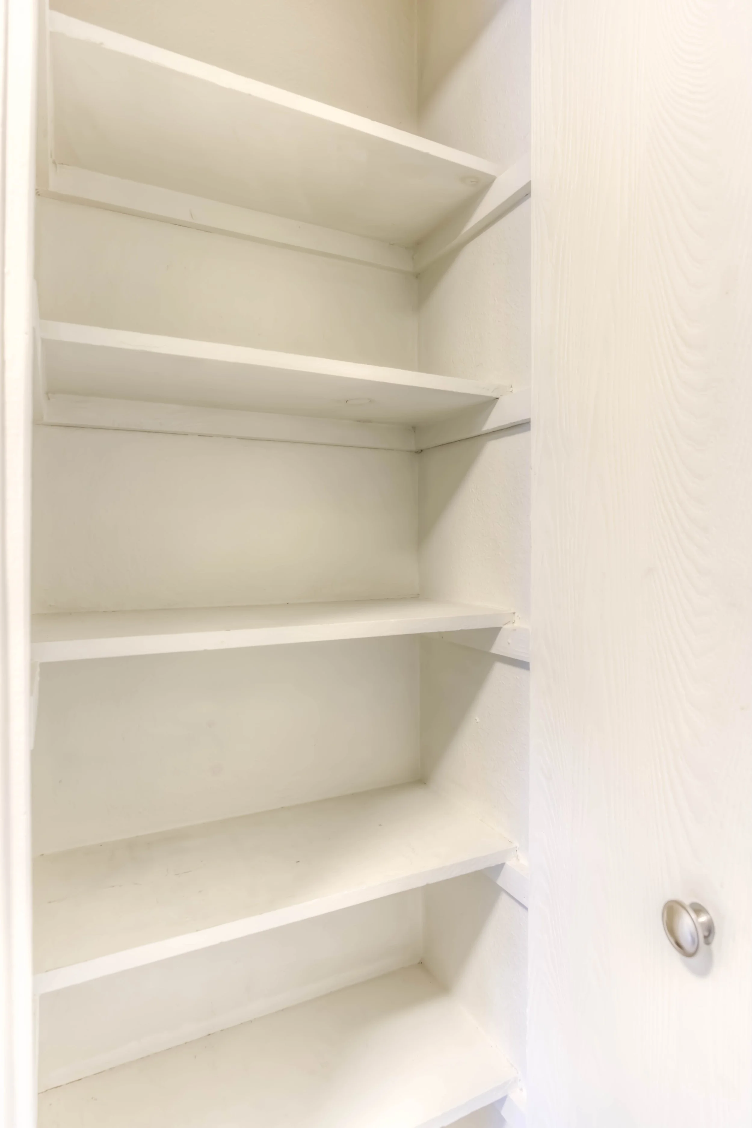 17 Hall Linen Closet.jpg
