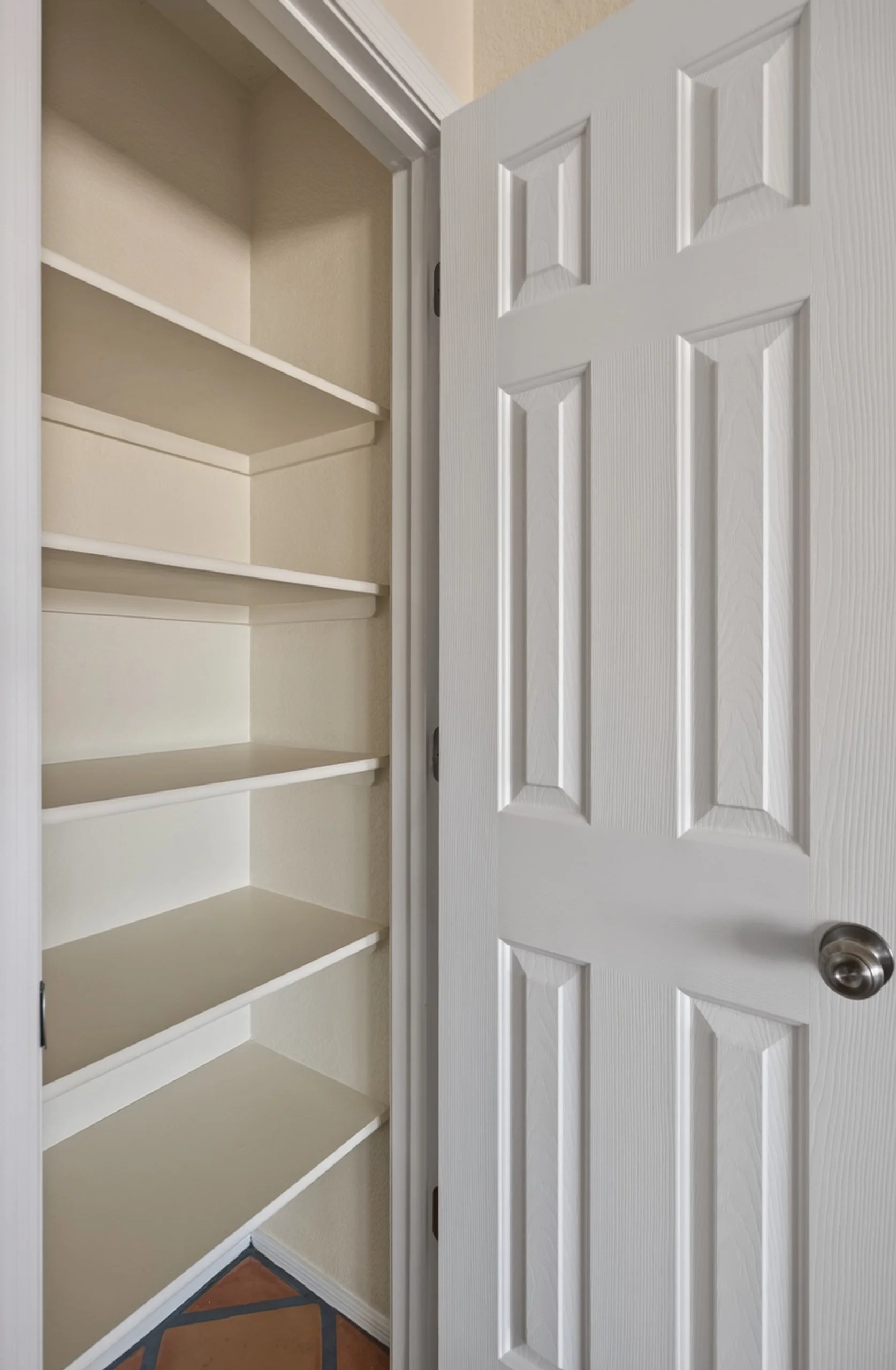 18 Downstairs Linen Closet.jpg