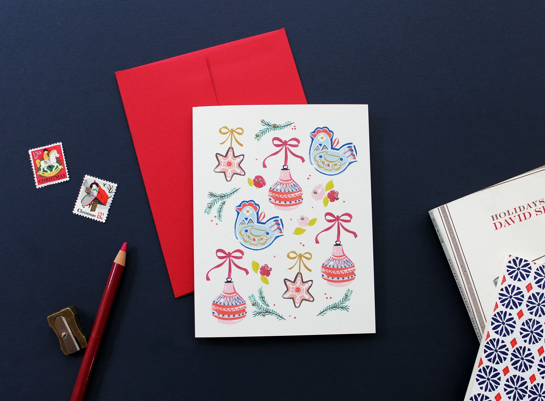 Driscoll Design's beautiful P320 Folk Ornaments Card embellished with gold glitter.