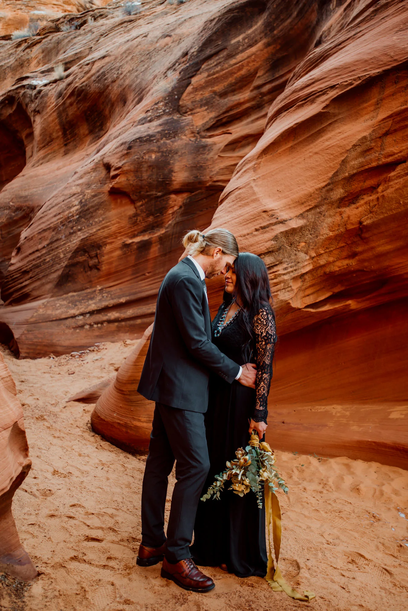 Shio and Ron share a quiet moment in the slot canyons.jpg
