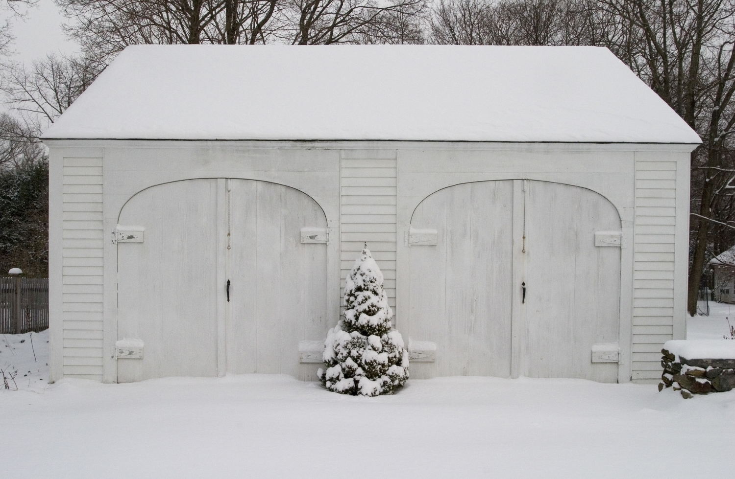 white garage covered in snow.jpg
