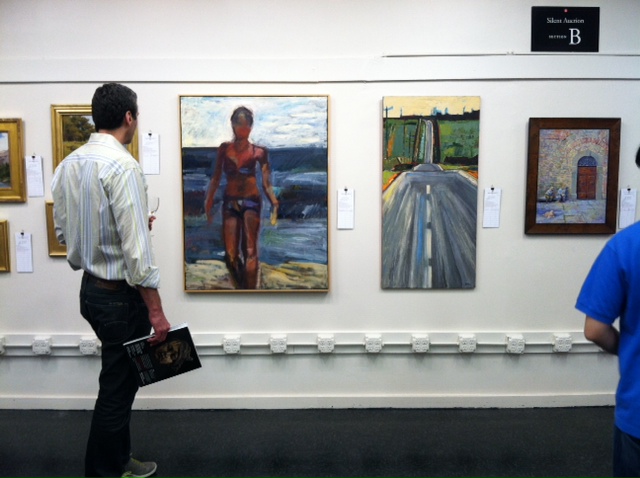 Academy of Art University Faculty/Alumni Auction patron checking out Beach Day and Vertical Road by Kim Ford Kitz. The Cannery, San Francisco, CA 2014