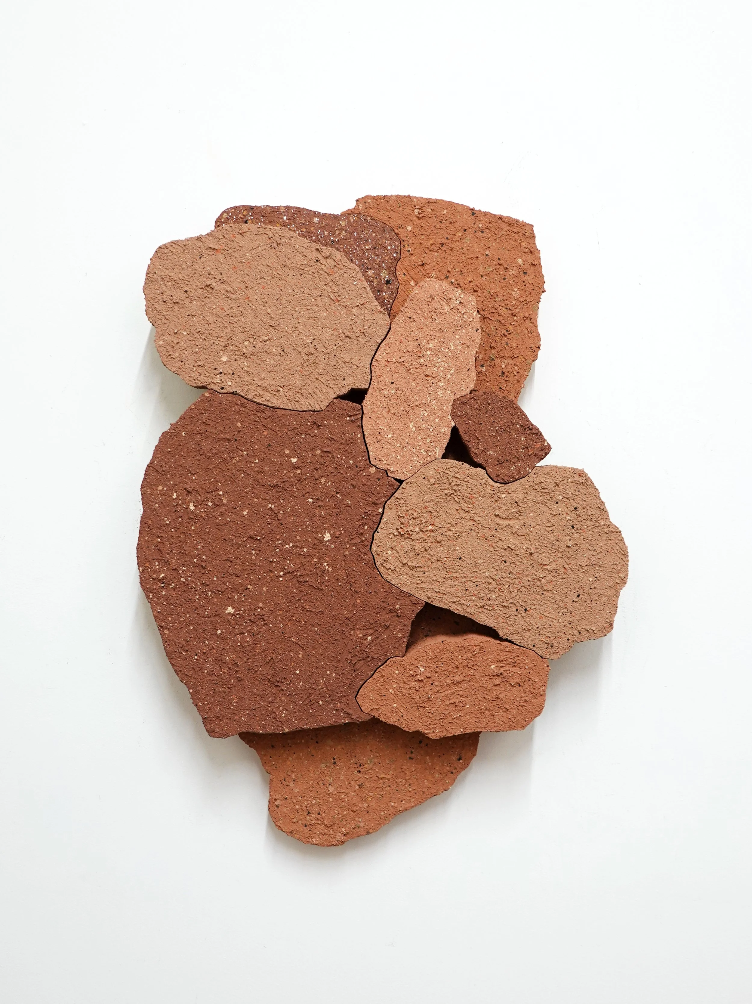  HEADSTONE - pile, 2026, stucco, acrylic and flashe on wood, 28 x 23 x 3.5” 