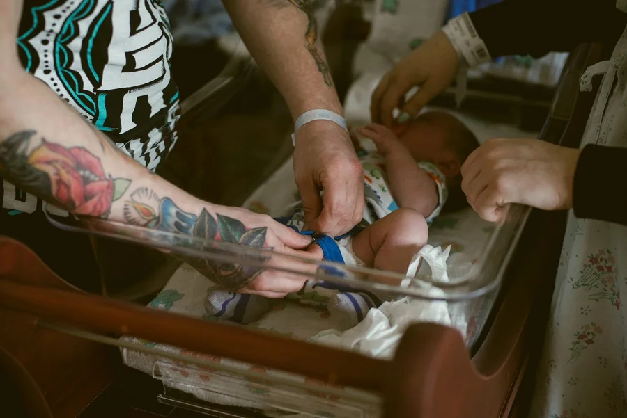 baby in hospital bassinet