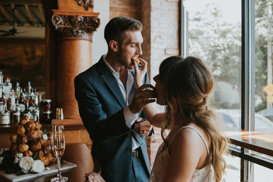 bride and groom eating cake