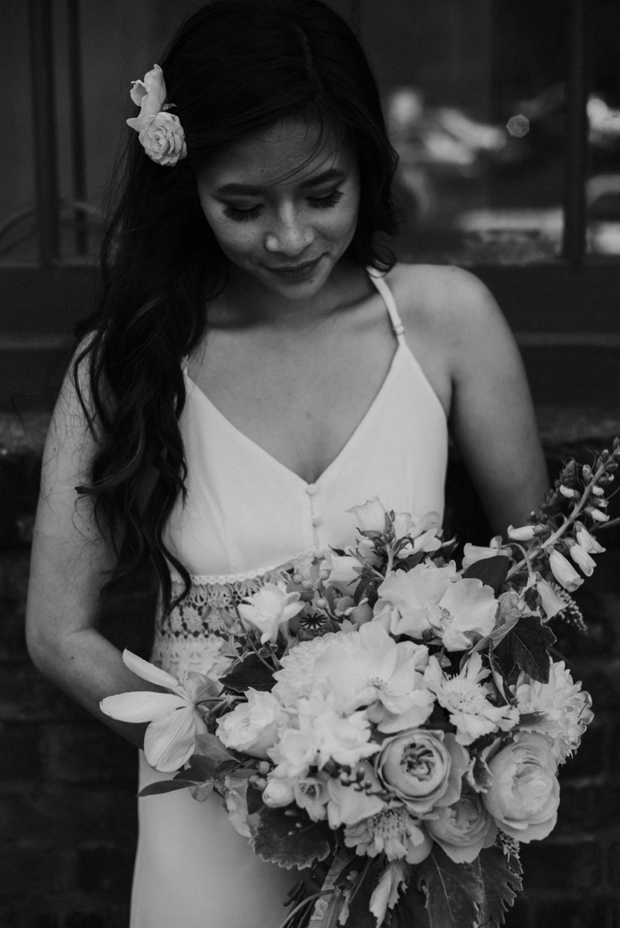 bride holding flowers
