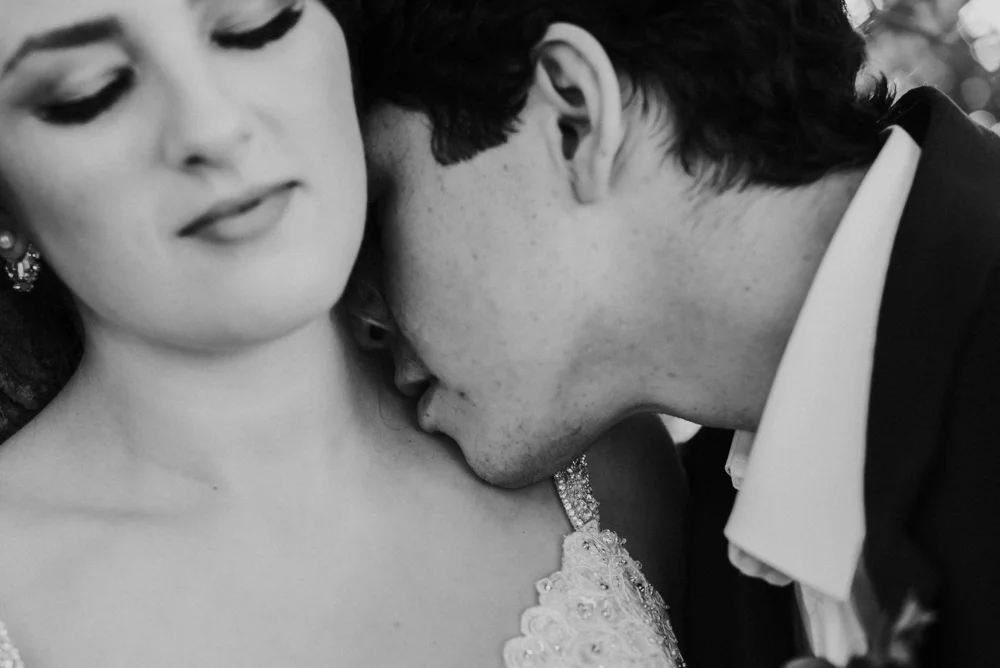 husband kissing wife gently