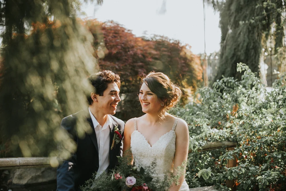 bride and groom laughing