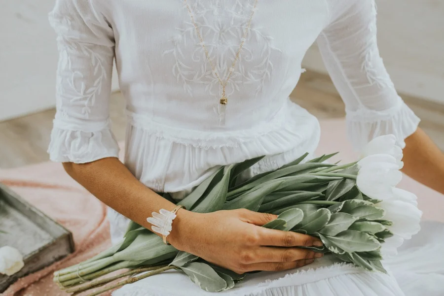bride holding flowers