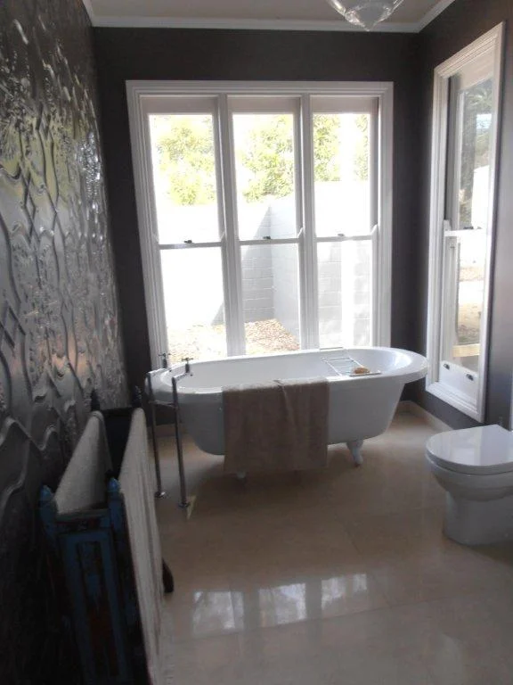 Ensuite Bathroom. Pressed Metal Wall Cladding, Bathtub, Vintage Lighting With Large Windows. Brookfield, Brisbane