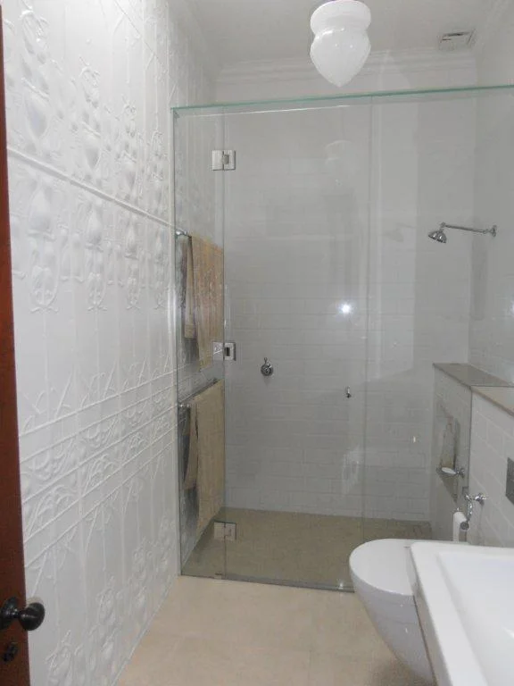 Main Bathroom With Vintage Lighting & Pressed Metal Wall Cladding. Skylight & Large Shower. Brookfield, Brisbane