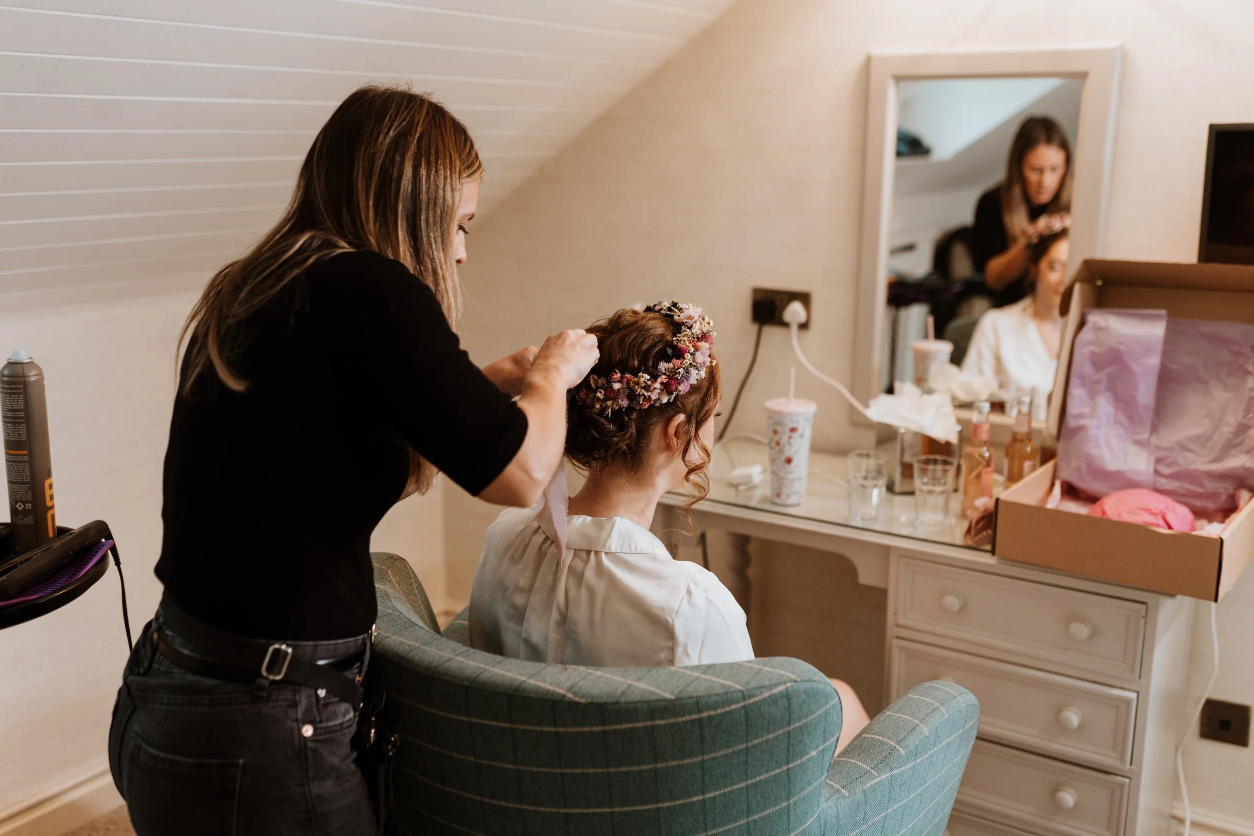  Bride getting ready in cosy Lake District wedding venue on a rainy morning 