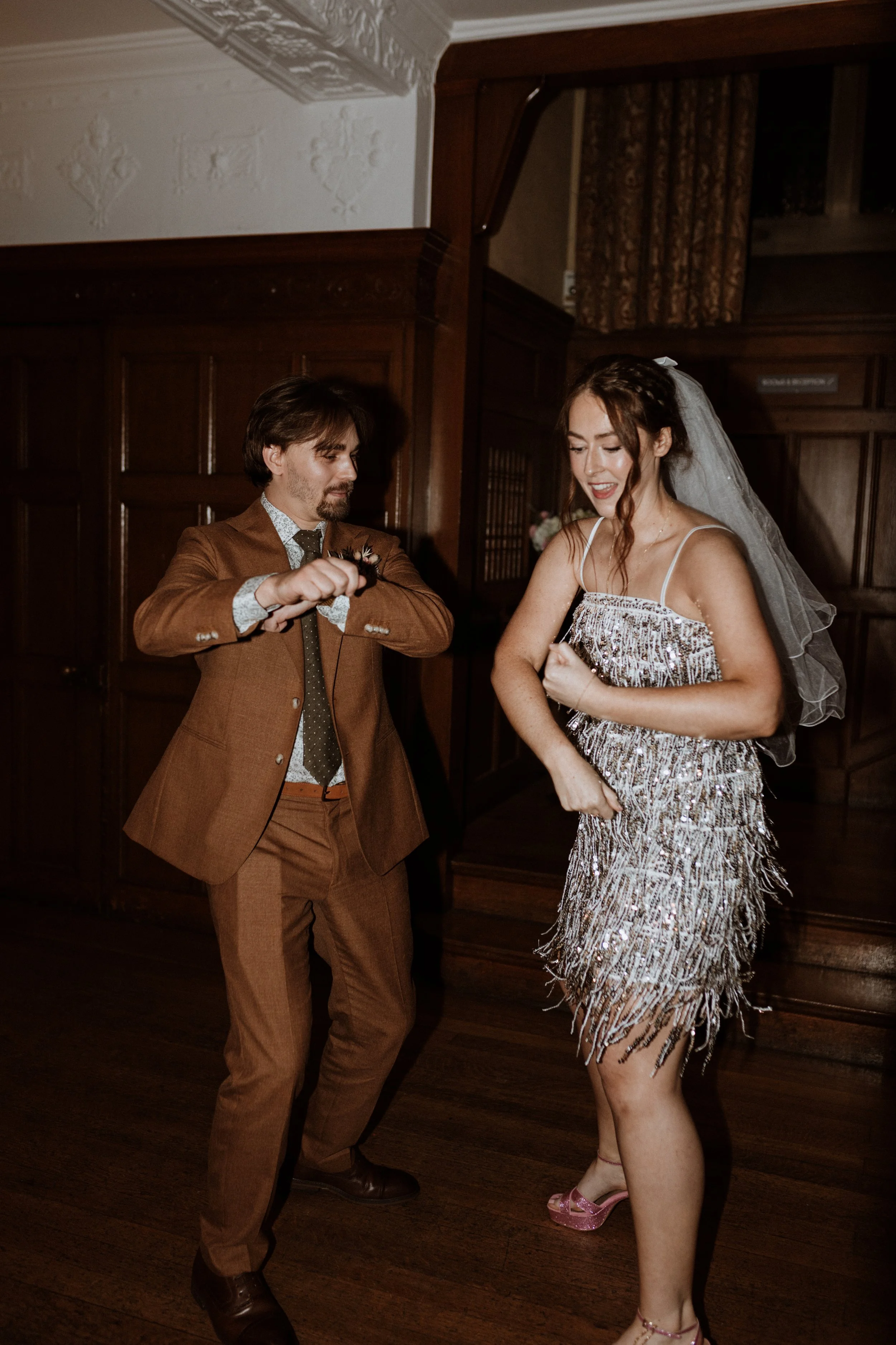  The bride and groom dance on the dance floor at their Lake District wedding.  