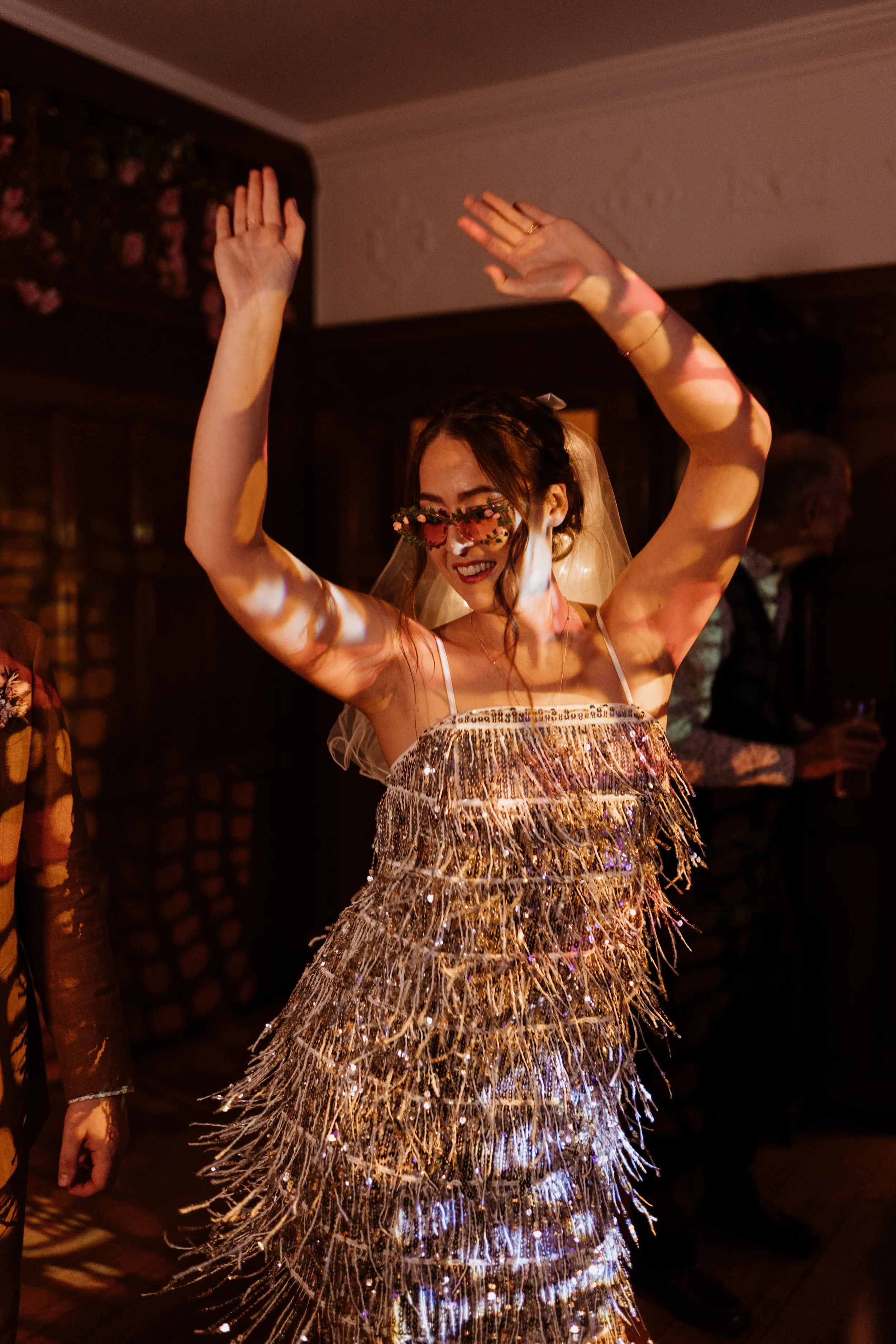  The bride dances on the dancefloor at their Lake District Wedding. 