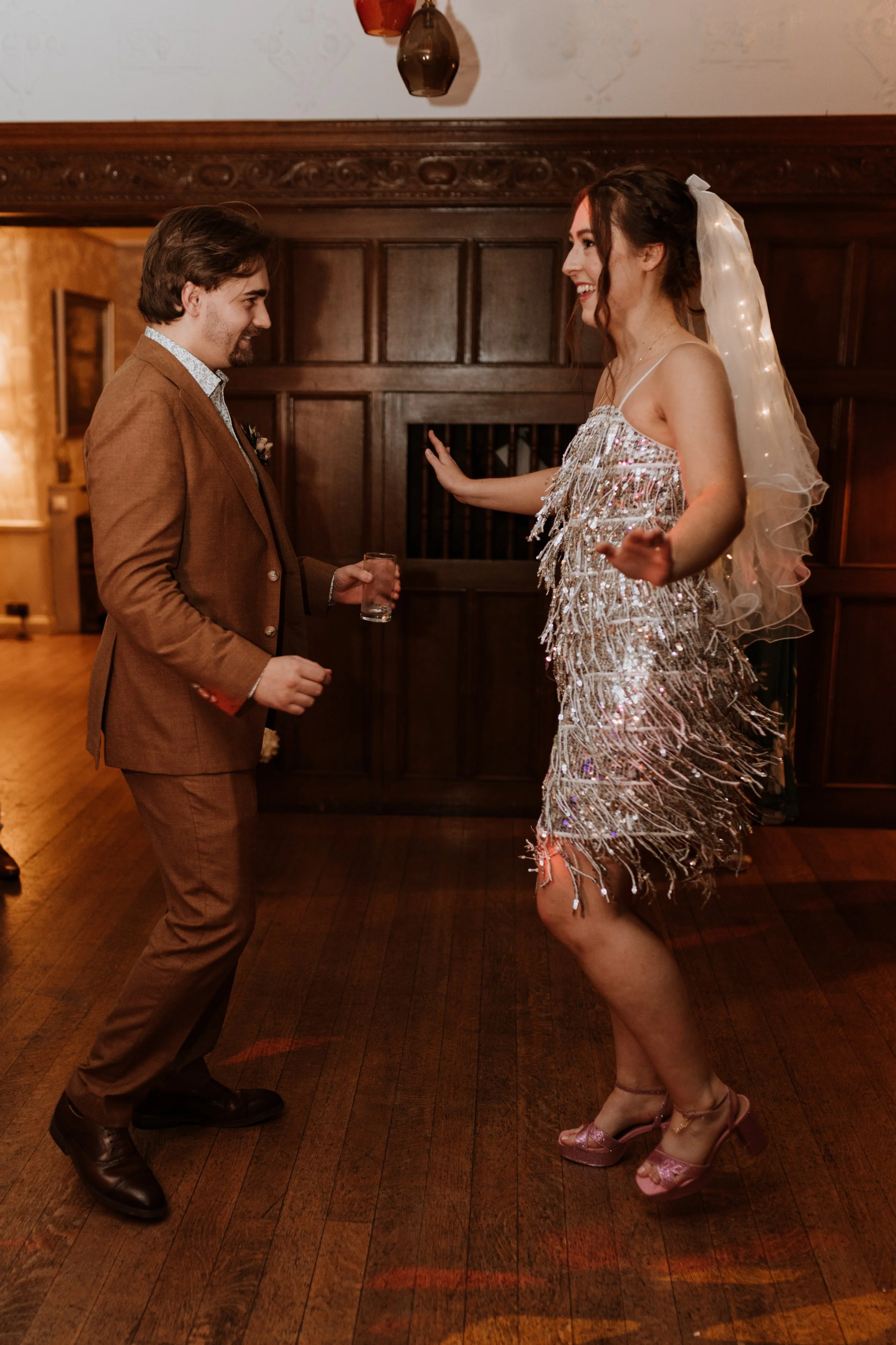  The bride and groom dance together at their Lake District wedding. 
