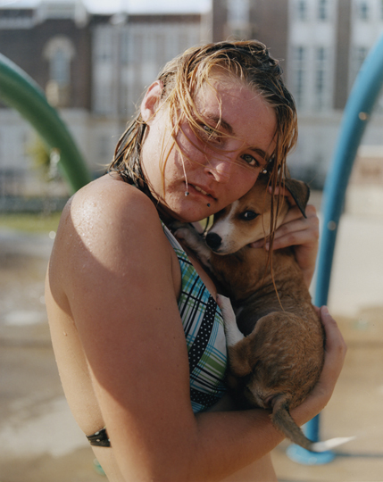 Woman holding a dog by Gregory Halpern from A collecdtion