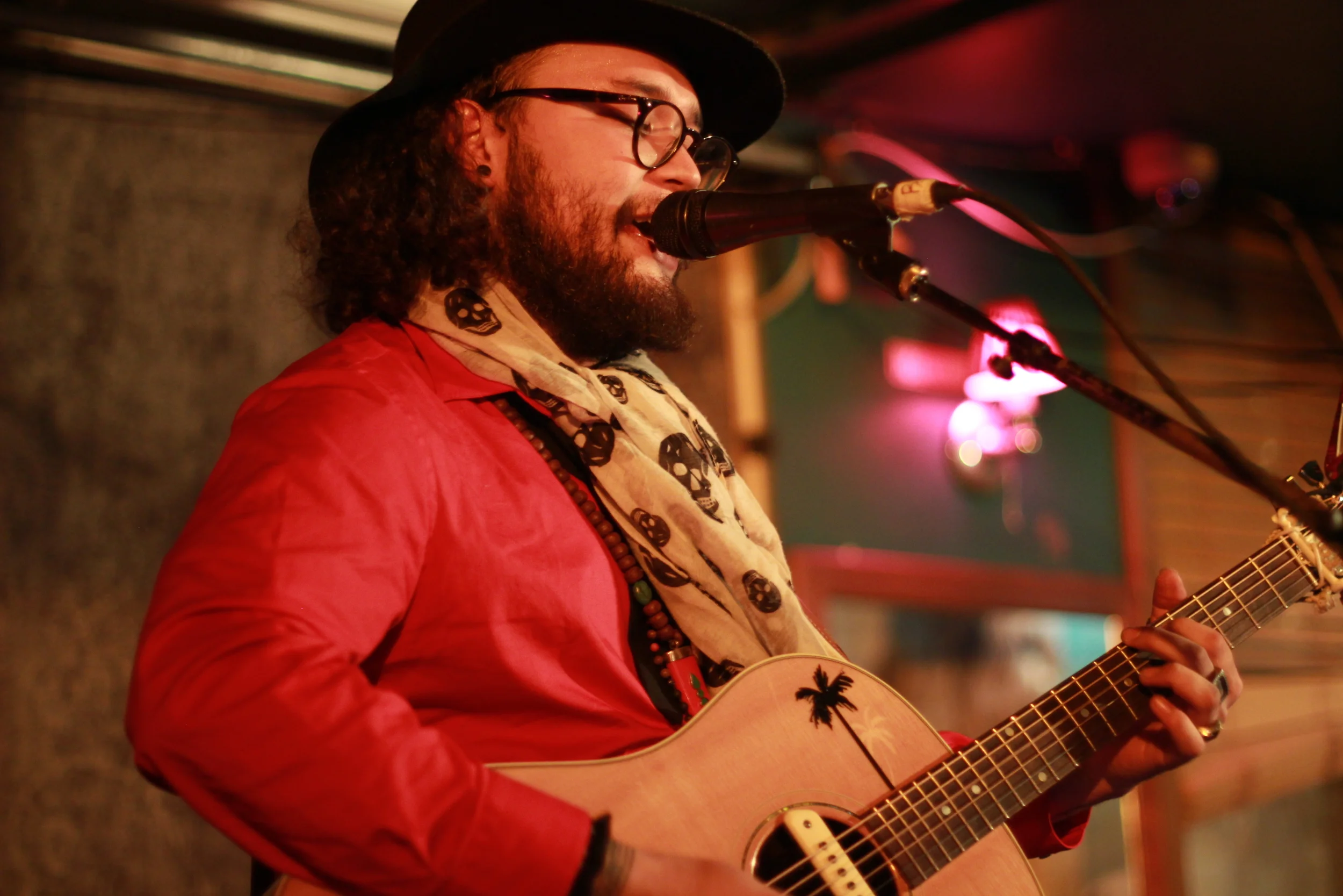 Kapali Long performing at Pianos