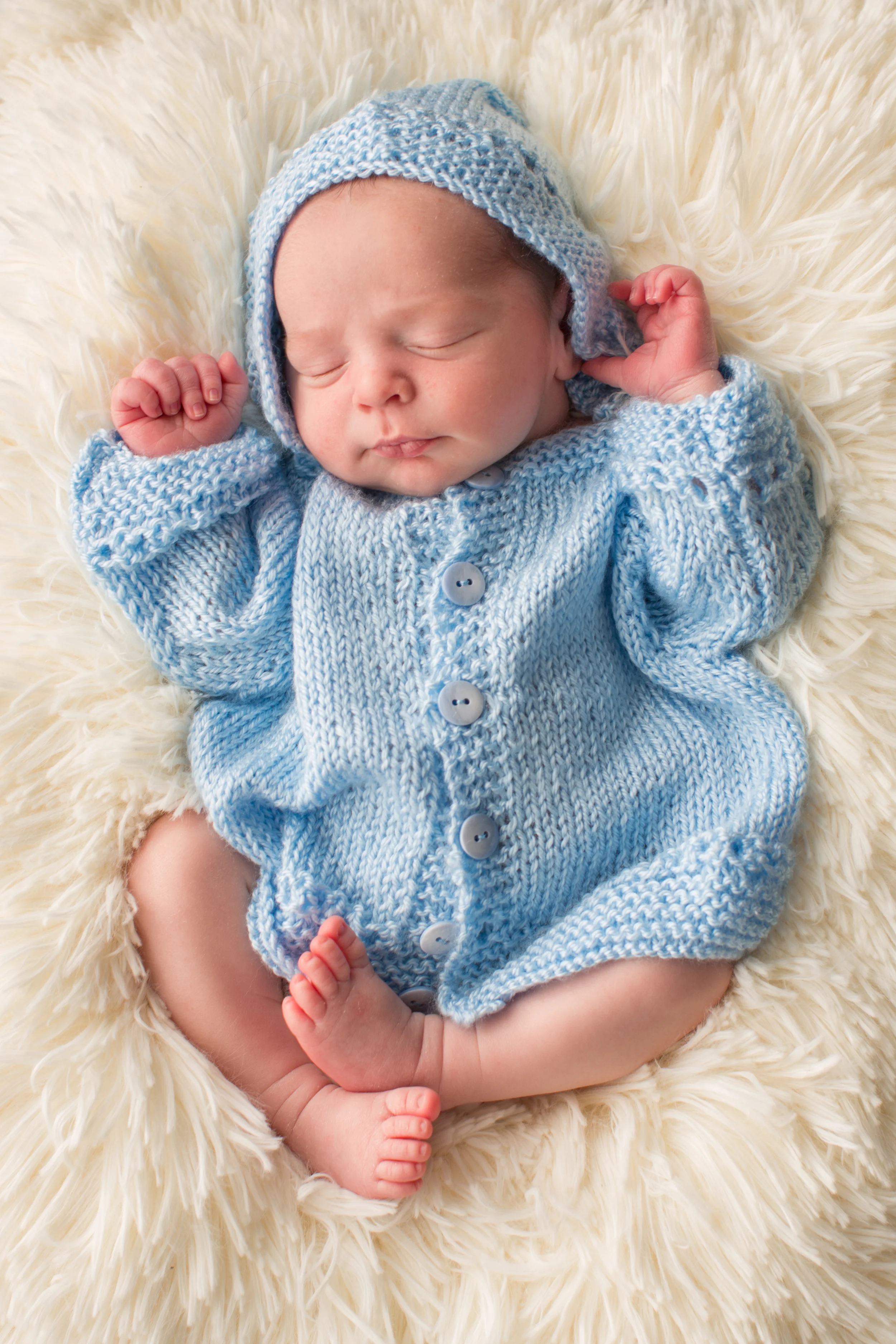 newborn baby in blue .jpg