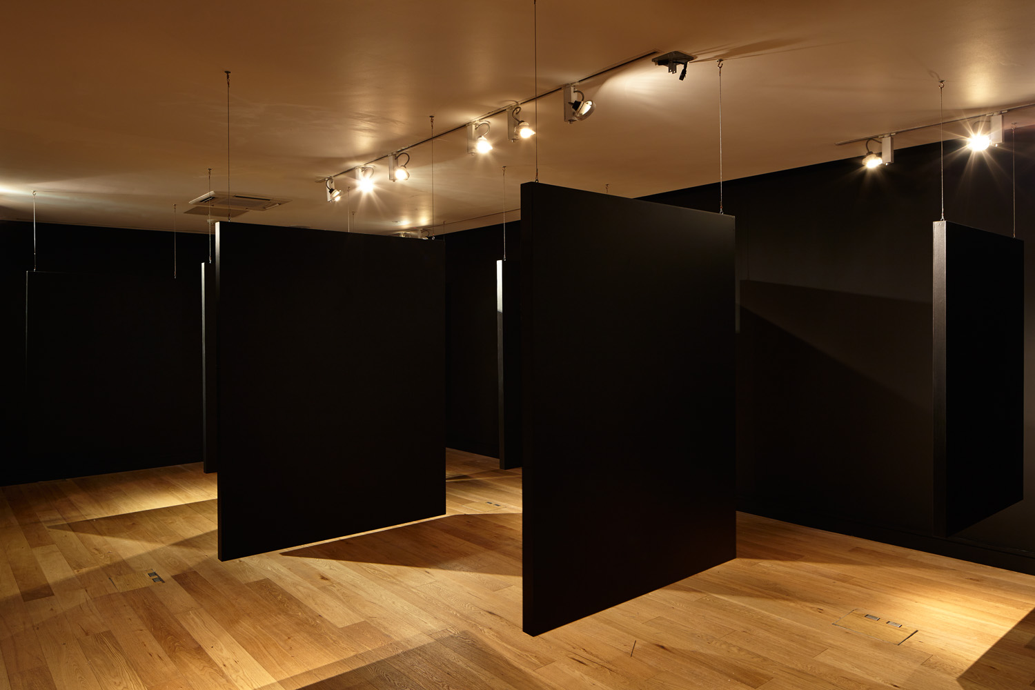 Wounded room installation: photographs and surround sound, The Mosaic Rooms, London, 2015