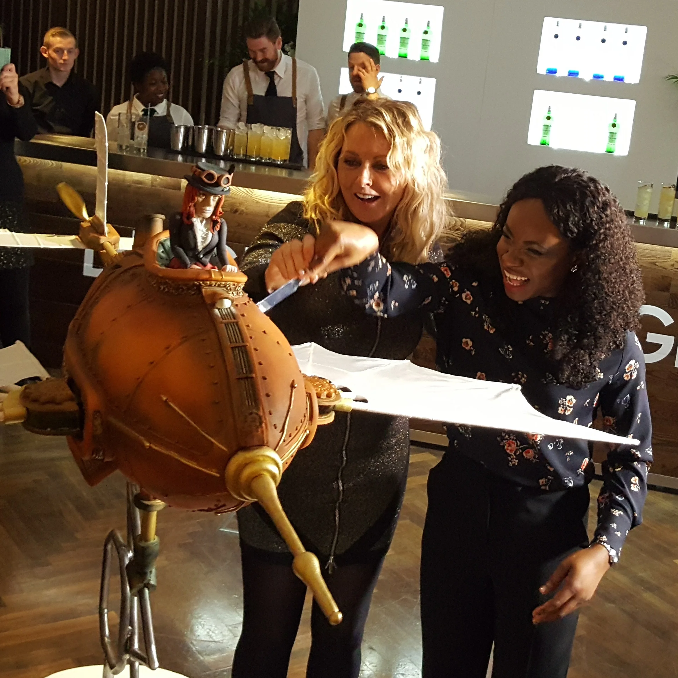 2018-Peboryon-Cornwall-London-Luxury-Celebration-Cake-Extreme-Cake-Makers-Channel-4-The-Ned-Steampunk-cake-Airplane-finished-carol-vorderman-cake-cutting.jpg