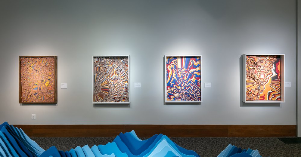 Four topographic sculptures from the "Altered Colorado" series. From left to right: "Craig", "Plowshares", "¡", and "The Nipple"