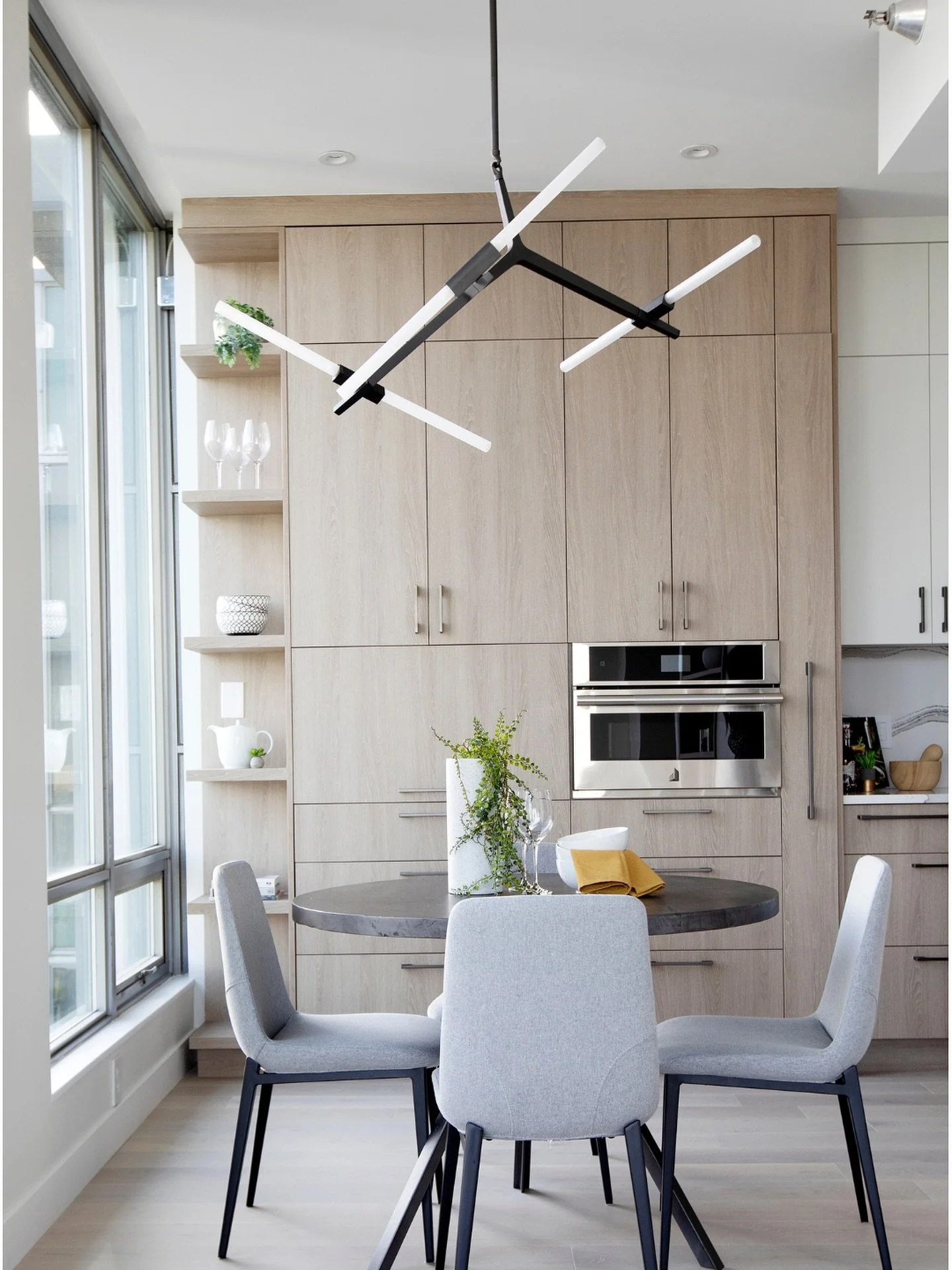 This West Georgia Street condo renovation blends sculptural minimalism with refined warmth &mdash; from the custom staircase to the sleek, streamlined kitchen.

A modern palette grounded in texture and light, designed to feel calm, quiet, and endurin