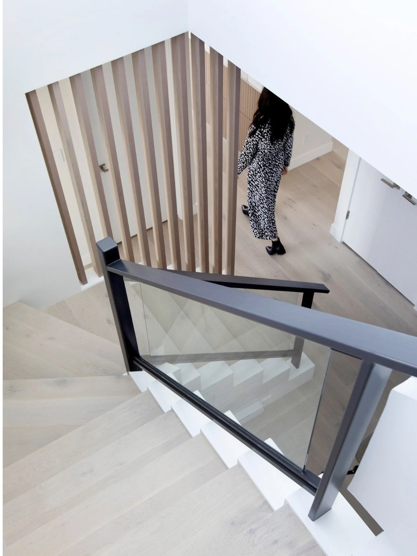 This West Georgia Street condo renovation blends sculptural minimalism with refined warmth &mdash; from the custom staircase to the sleek, streamlined kitchen.

A modern palette grounded in texture and light, designed to feel calm, quiet, and endurin